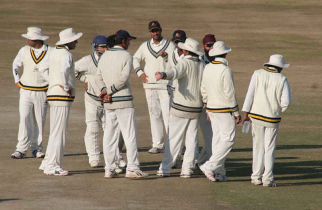 The Himachal Pradesh squad converge after a dismissal, Himachal Pradesh v Rajasthan, Ranji Trophy Super League, Group A, 7th round, 2nd day, Dharamsala, December 26, 2007 
