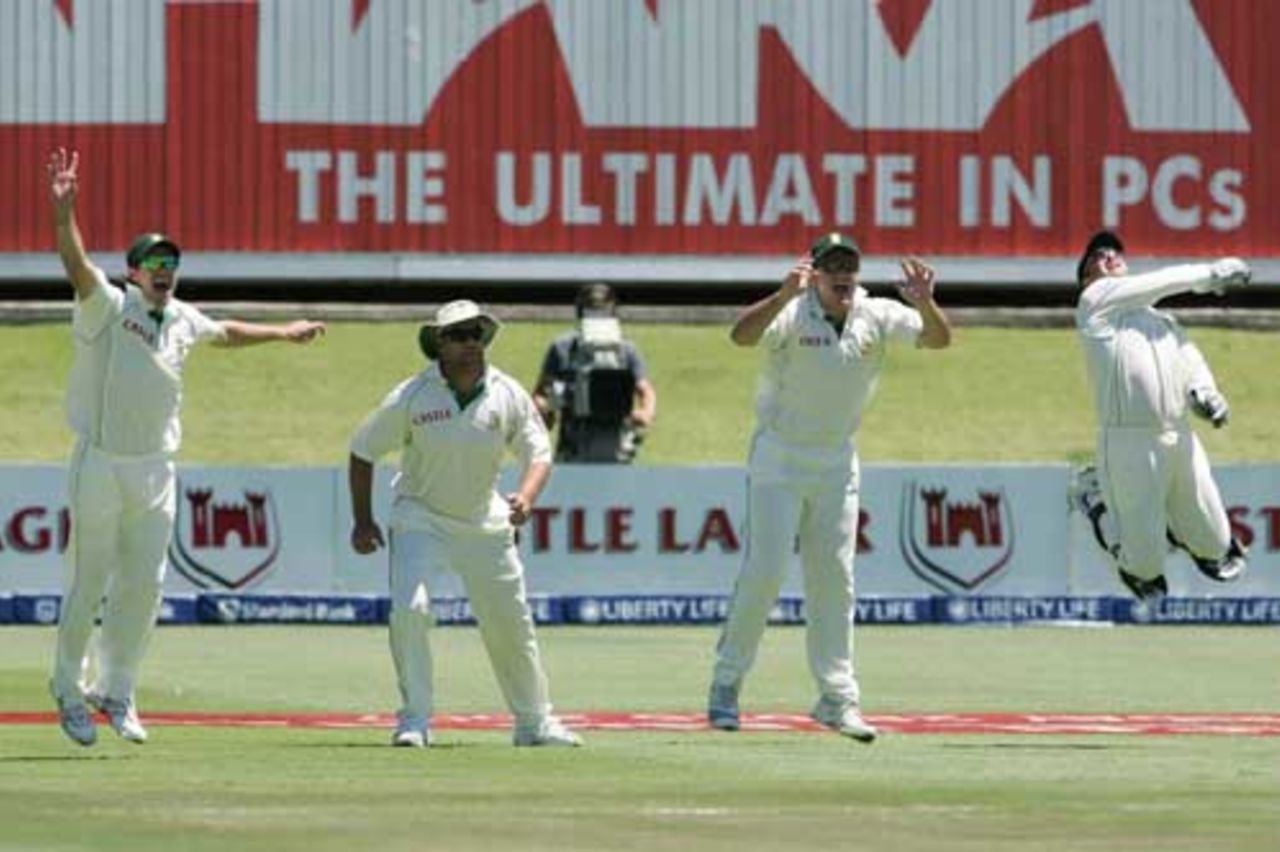 The South African slip cordon launch into an appeal while Mark Boucher celebrates a catch, South Africa v West Indies, 1st Test, Port Elizabeth, 2nd day, December 27, 2007
