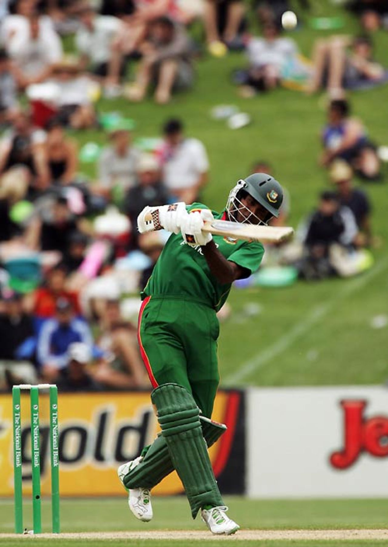 Junaid Siddique takes the aerial route over the on side, New Zealand v Bangladesh, 2nd ODI, Napier, December 28, 2007
