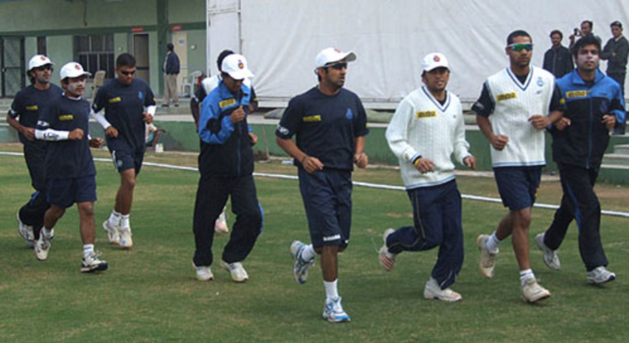 The Delhi team takes a jog on the eve of the semi-final against Baroda, Indore, January 4, 2008