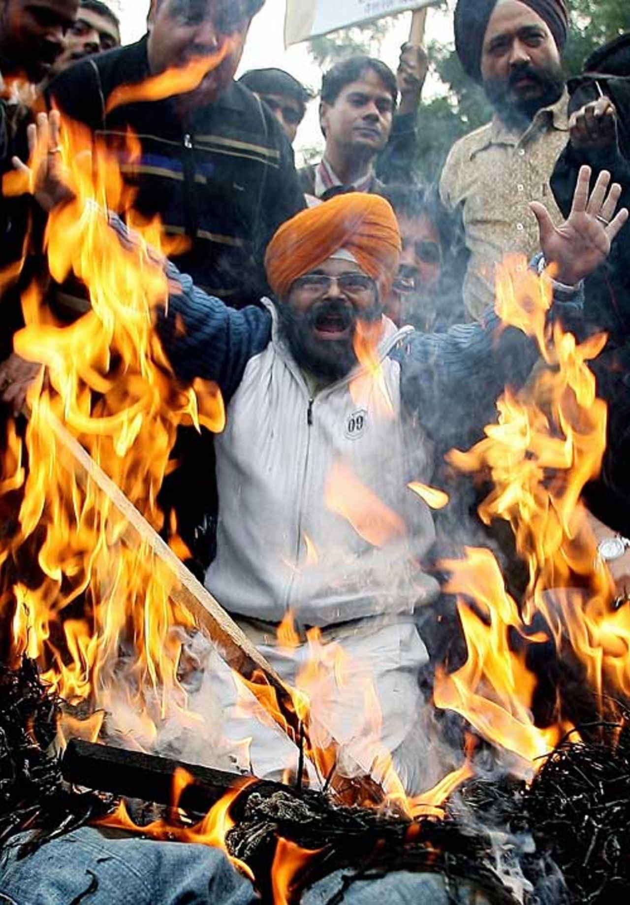 Indian fans burn effigies in the streets following events in Australia, New Delhi, January 7, 2008
