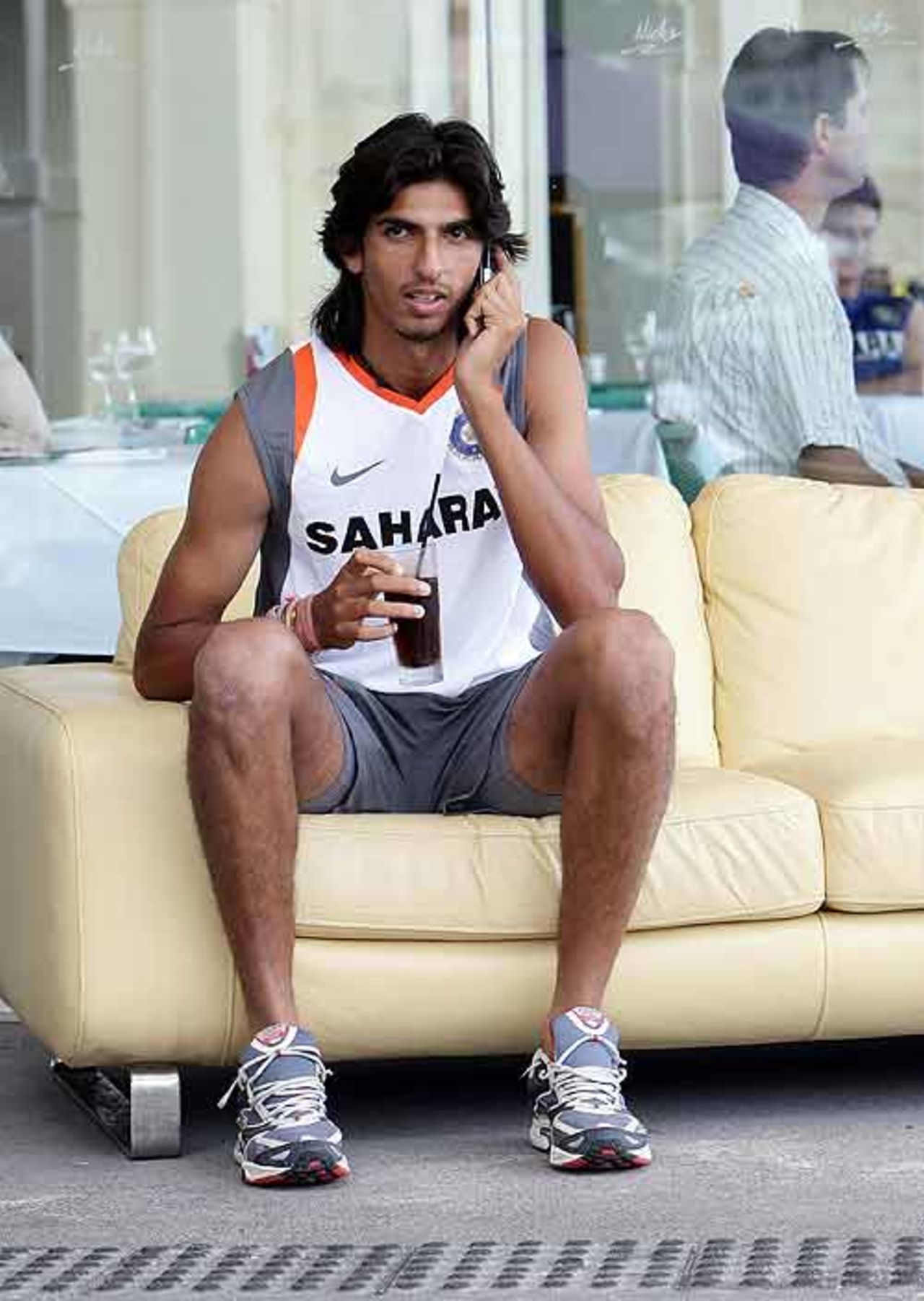 Ishant Sharma takes time out for a call, Sydney, January 8, 2008