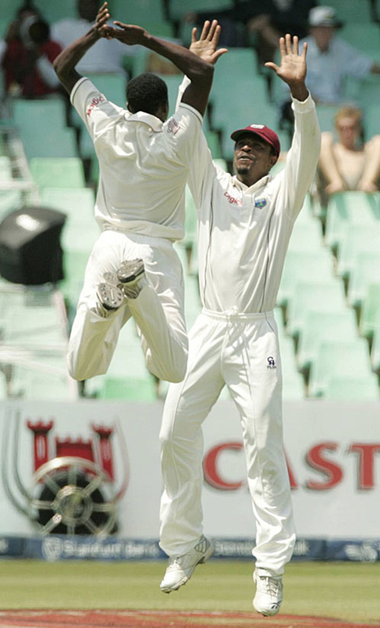 Jerome Taylor leaps up to celebrate Graeme Smith's wicket with Runako Morton, South Africa v West Indies, 3rd Test, Durban, January 11, 2008