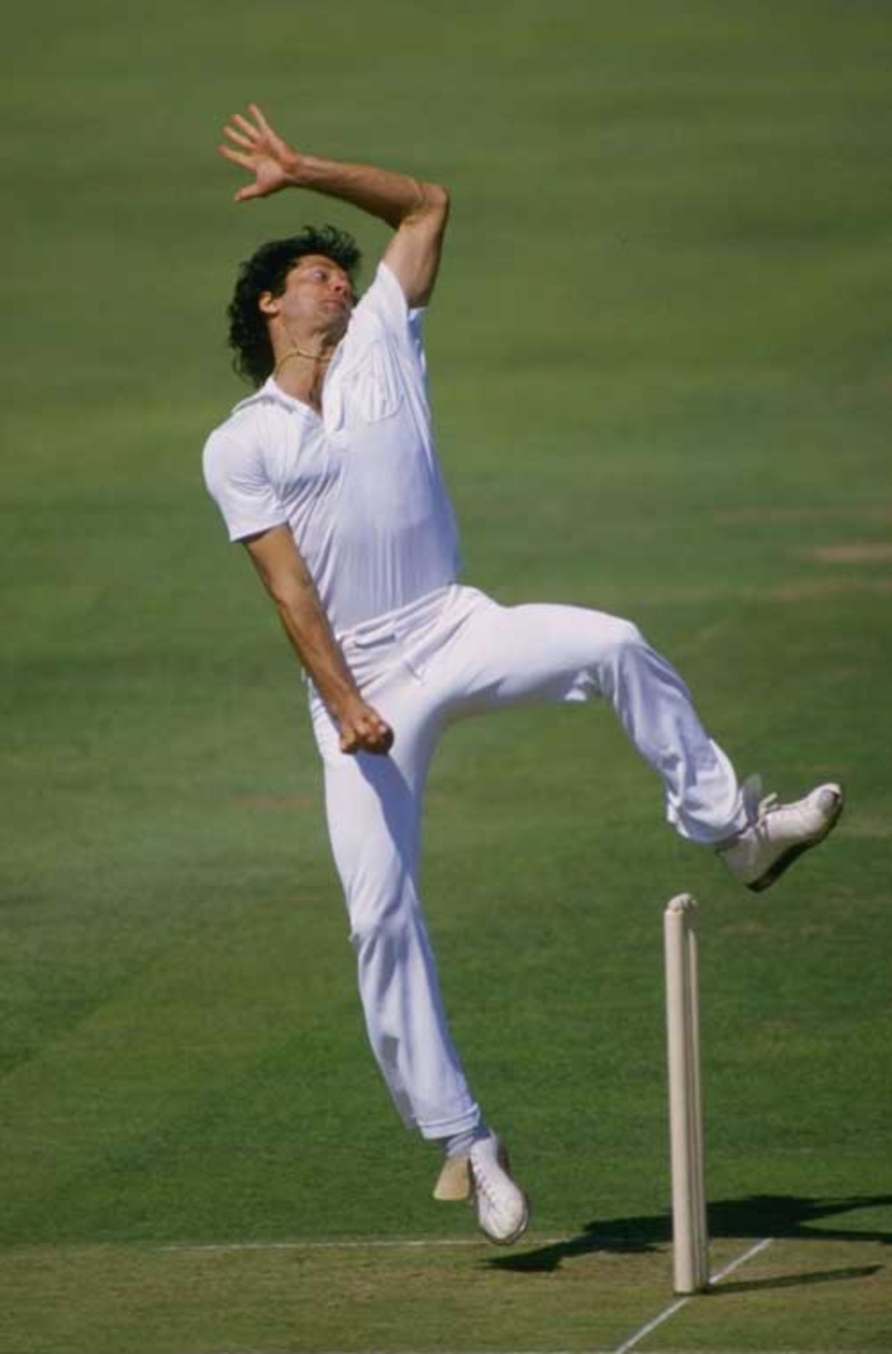 Imran Khan bowling for Rest of the World during the Bicentenary match against MCC, August 1987