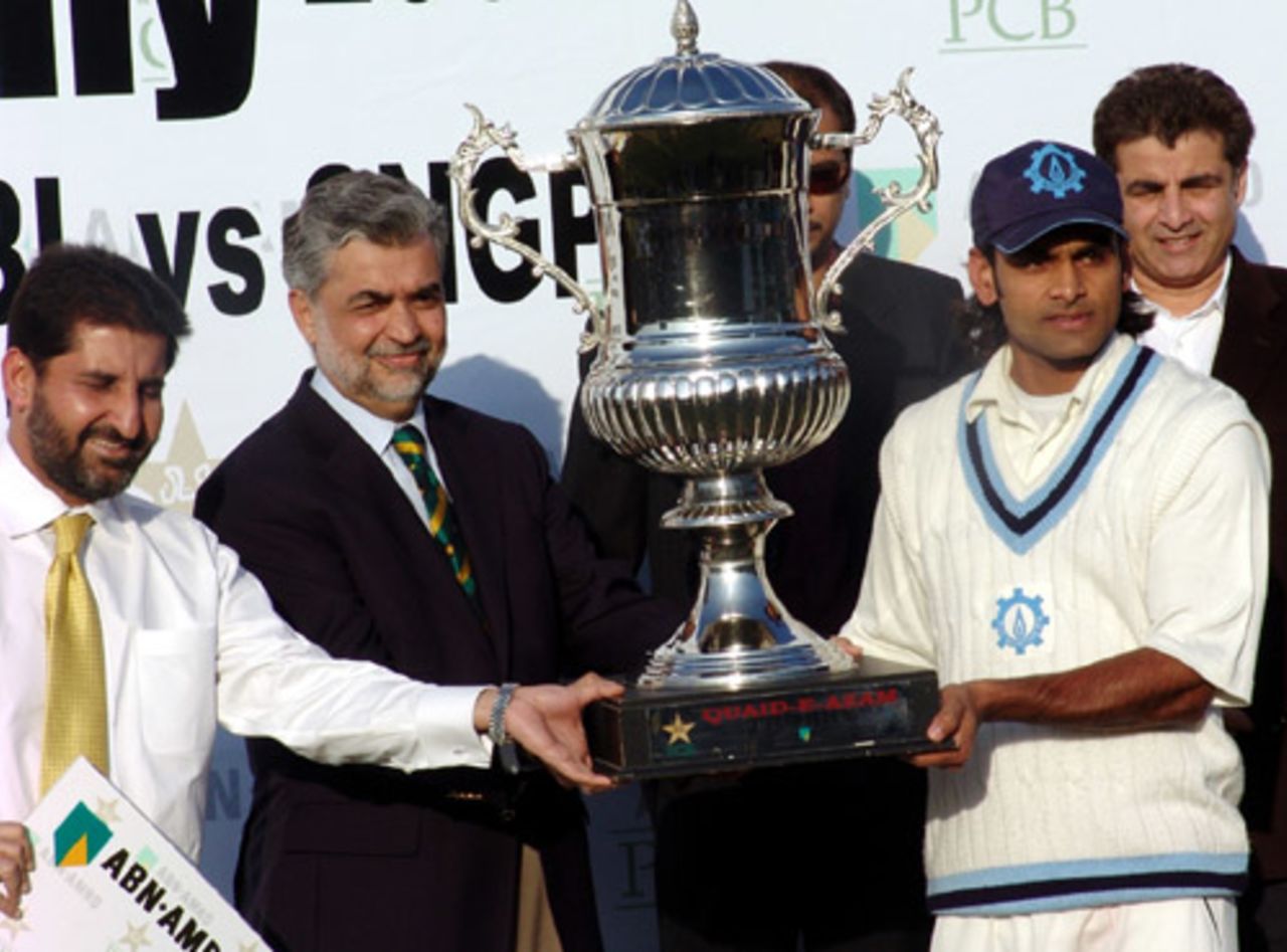 Mohammad Hafeez, the captain of Sui Northern Gas Pipeline Limited, receives the silverware, HBL v SNGPL, Quaid-e-Azam Trophy final, Karachi, 5th day, January 11, 2008