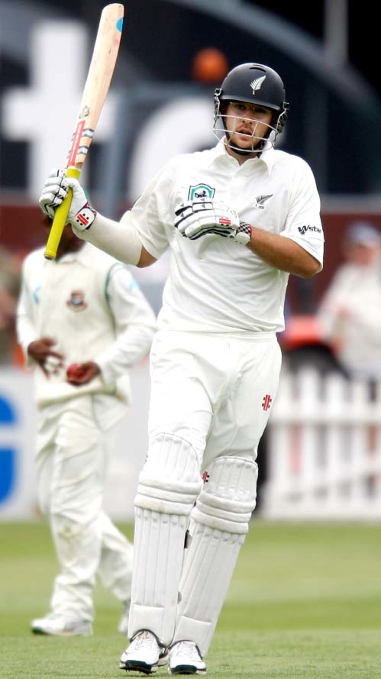 Daniel Vettori raises the bat after completing his fifty, New Zealand v Bangladesh, 2nd Test, Wellington, 2nd day, January 13, 2008