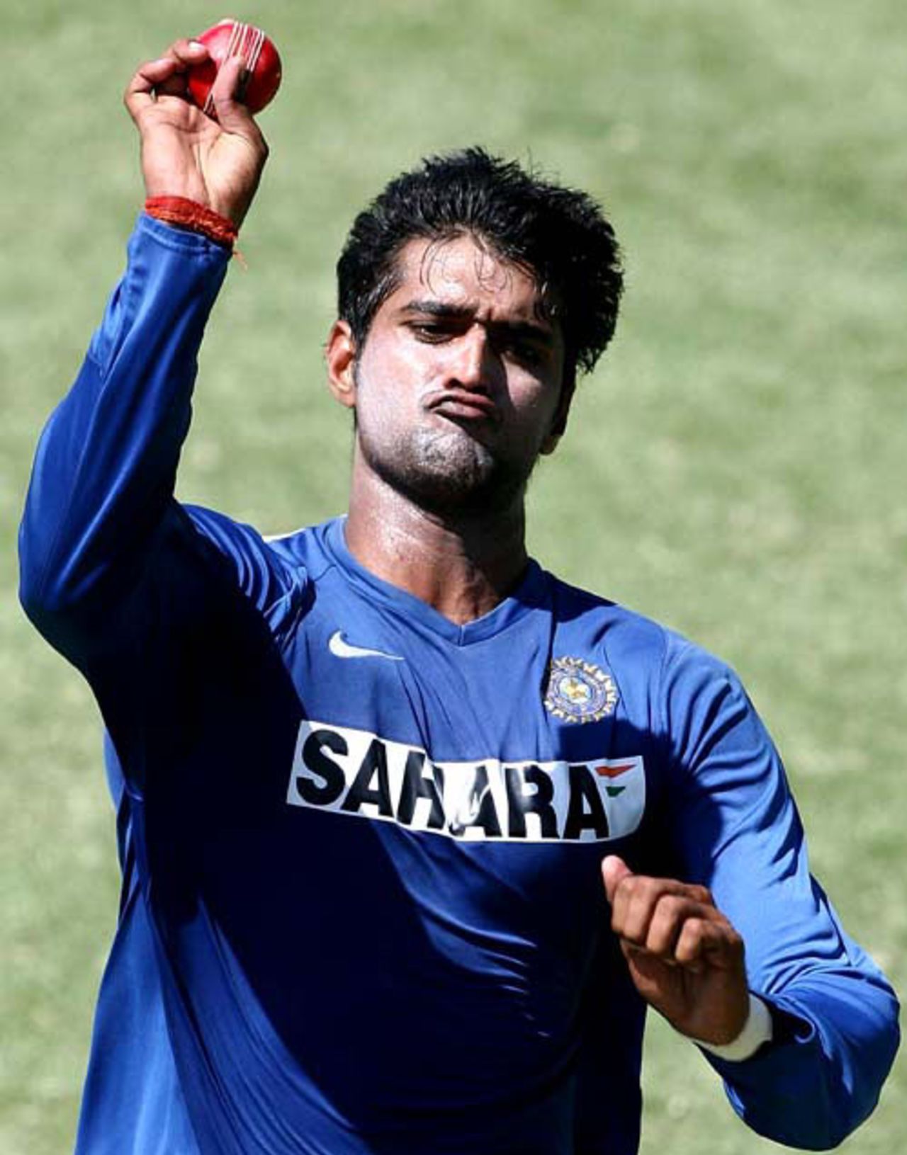 Pankaj Singh steams in during practice, Perth, January 14, 2008