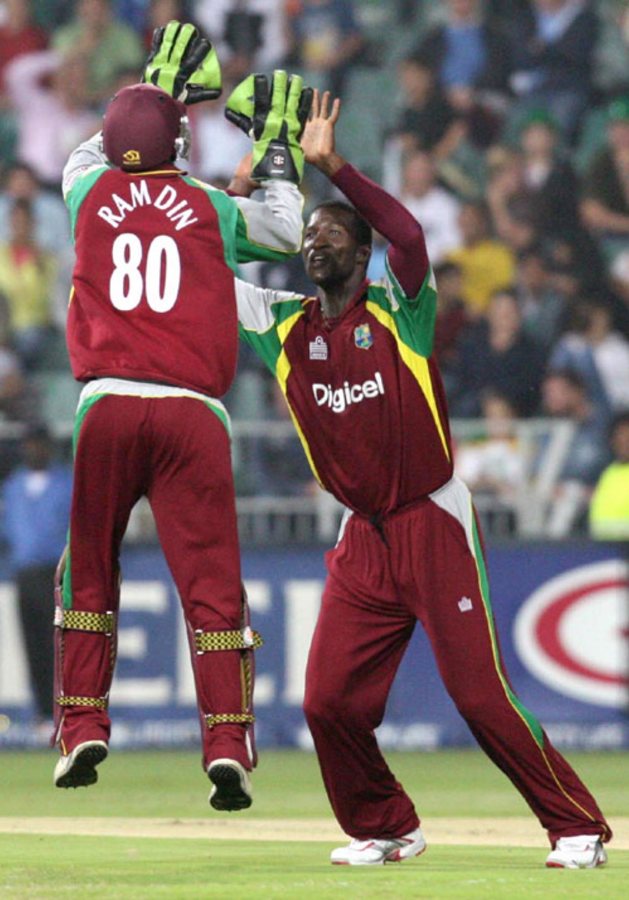 Extra-high fives ... Darren Sammy celebrates with Denesh Ramdin, South Africa v West Indies, 2nd Twenty20, Wanderers, January 18, 2008