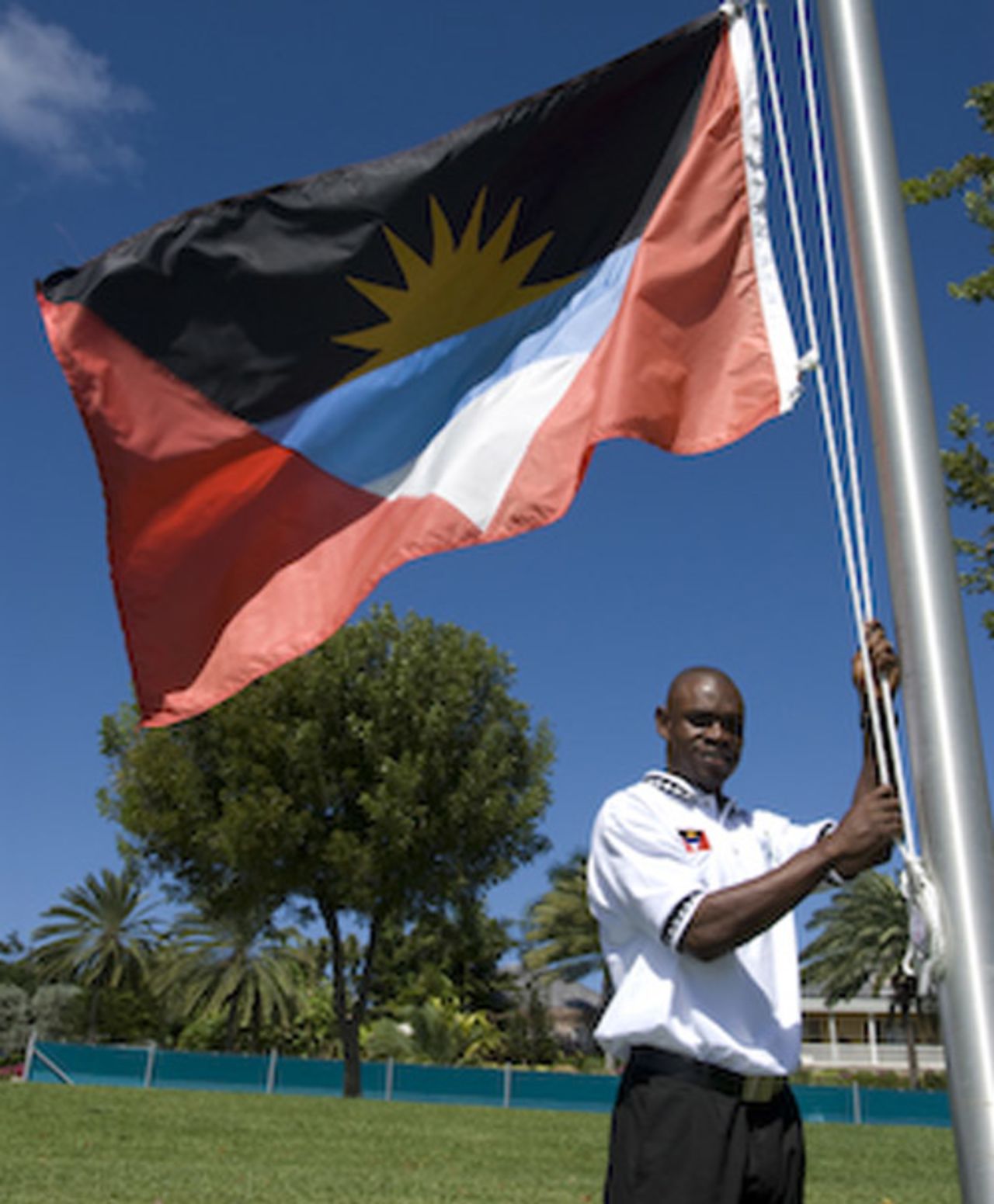Sylvester Joseph hoists Antigua and Barbuda's flag, Antigua, January 25, 2008 