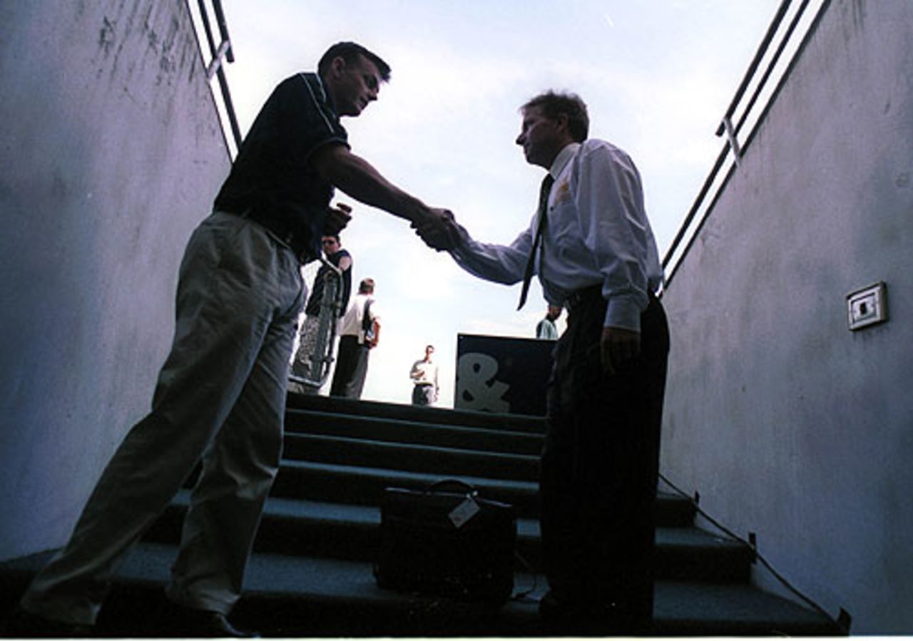 Adam Gilchrist shakes hands with Ian Healy on the eve of his Test debut
