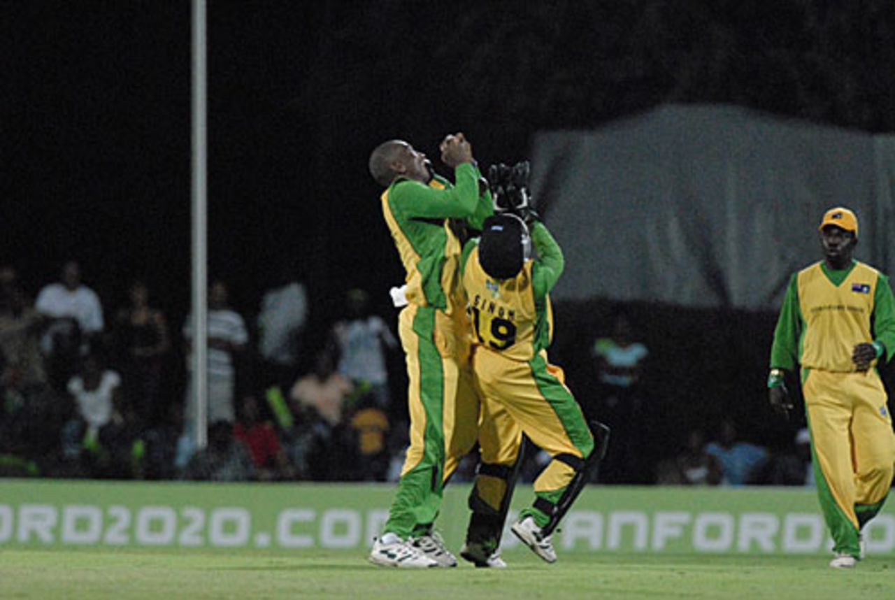 British Virgin Islands keeper Daniel Singh and a fielder unsuccessfully try to catch the ball to dismiss Roy Marshall, British Virgin Islands v Dominica, 3rd match, Stanford 20/20, Antigua, January 27, 2007