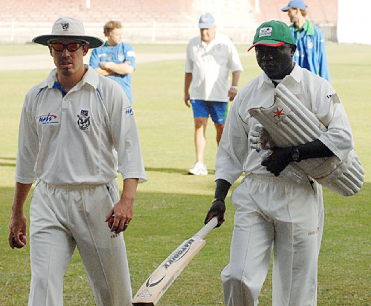 Steve Tikolo and Louis Burger return after the toss which was won by Kenya, Kenya v Namibia, Intercontinental Cup, Sharjah, January 29, 2008