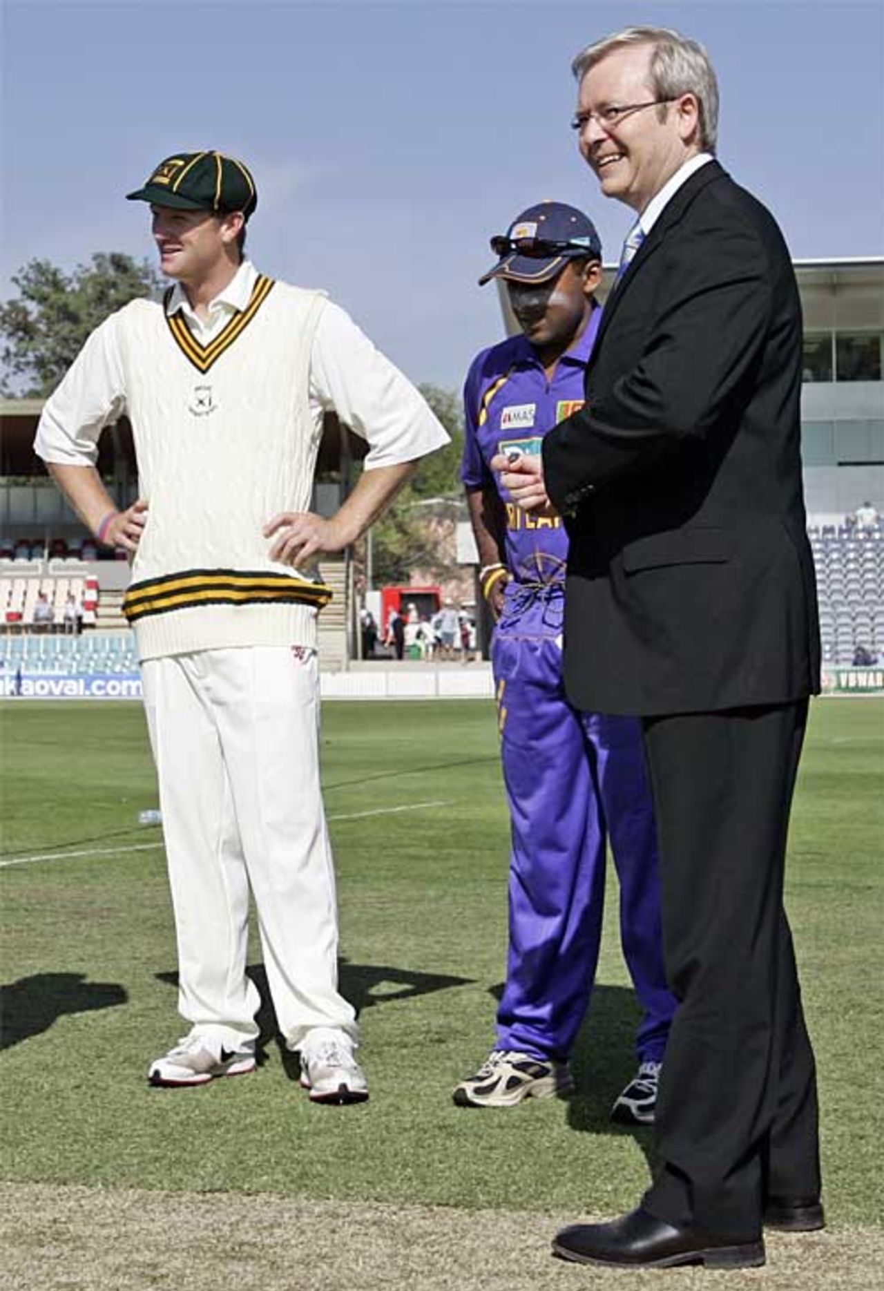 Australian PM Kevin Rudd prepares for the toss with Cameron White and Mahela Jayawardene, Prime Minister's XI v Sri Lankans, Tour match, Canberra, January 30, 2008