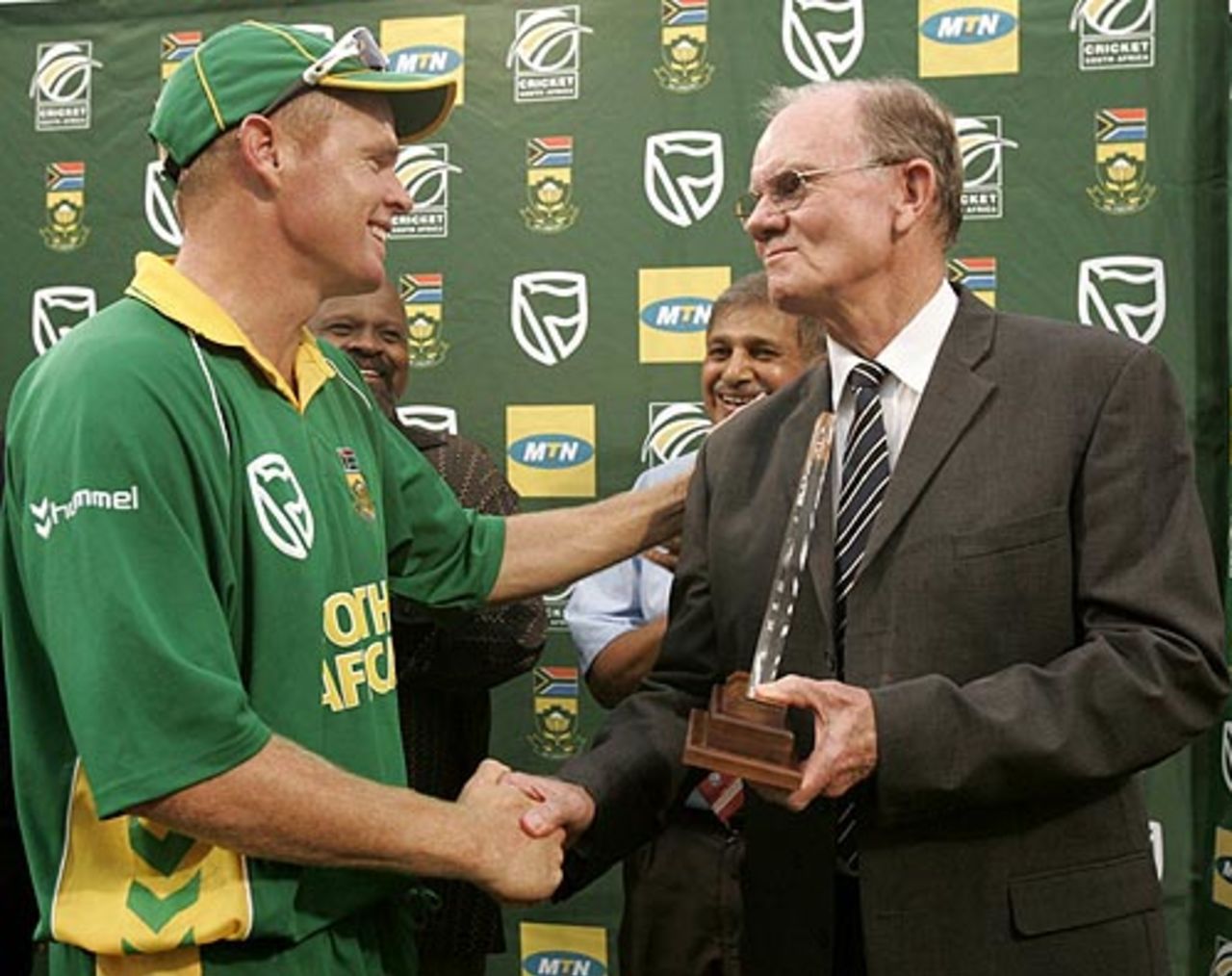 Shaun Pollock receives a memento from his father Peter during his final ODI appearance at home ground Kingsmead, South Africa v West Indies, 4th ODI, Durban, February 1, 2008