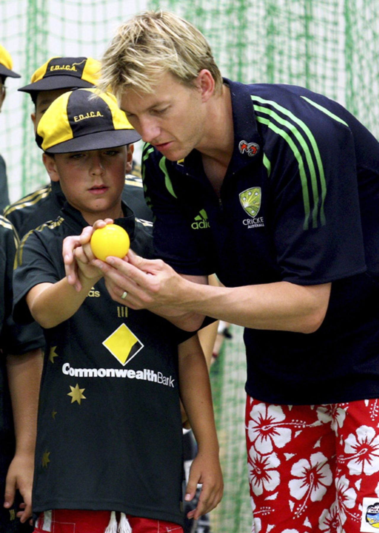This is how you do it: Brett Lee provides some tips to a young bowler, Brisbane, February 2, 2008 