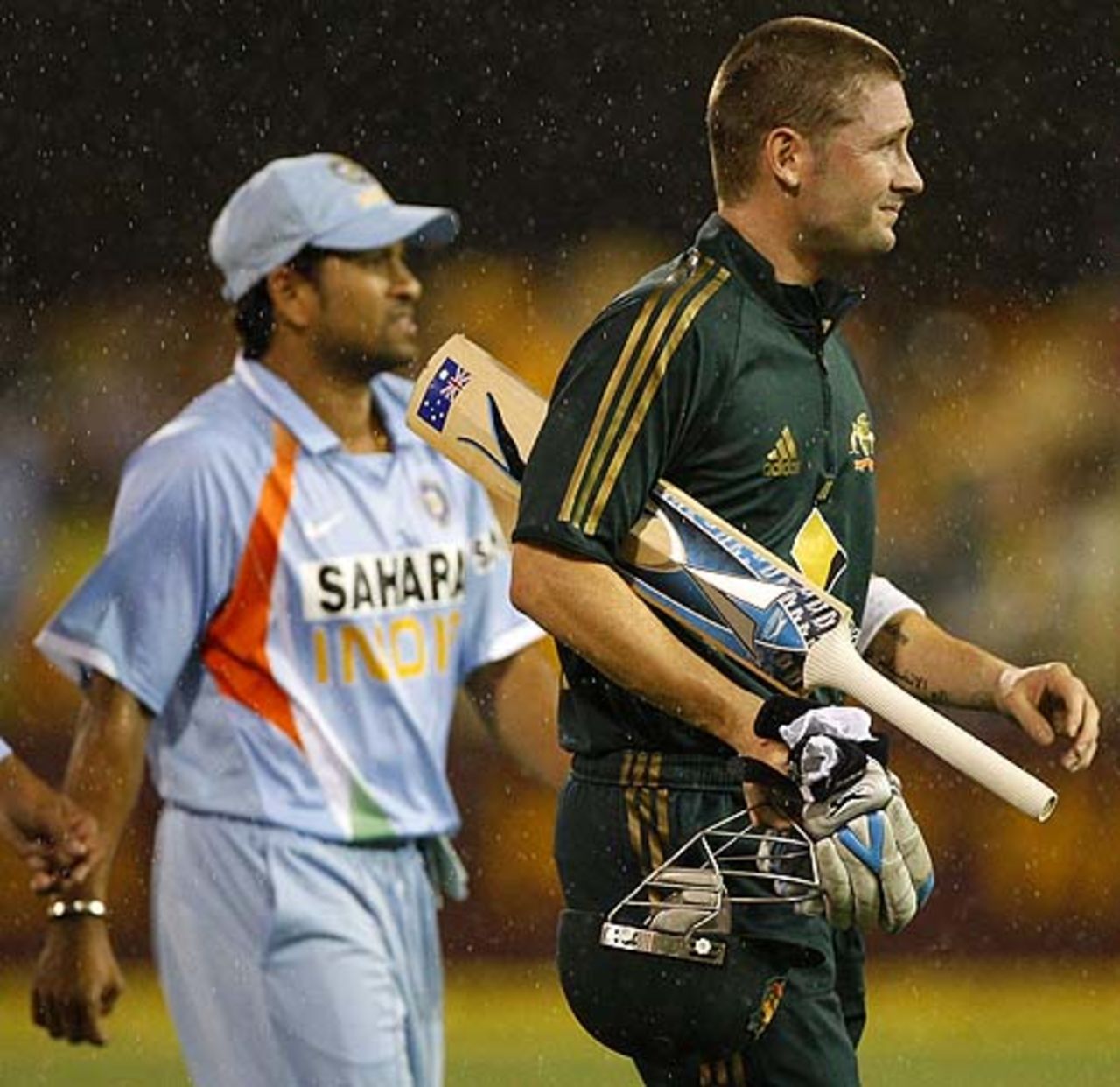 Michael Clarke and Sachin Tendulkar walks off as the rain pours down, Australia v India, CB series, 1st ODI, Brisbane, February 3, 2008