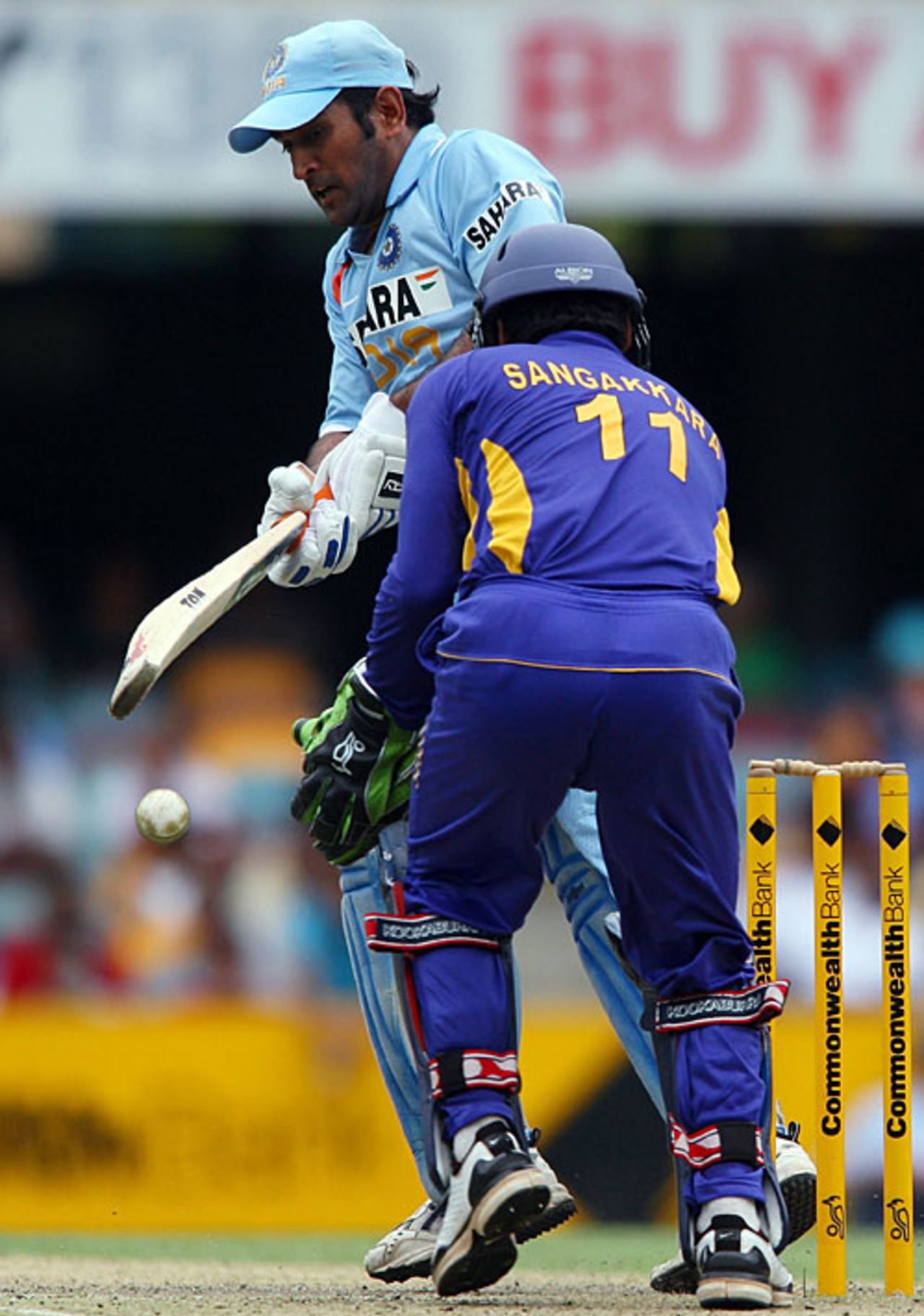 Mahendra Singh Dhoni tries to tap one down to fine leg , India v Sri Lanka, CB Series, 2nd ODI, Brisbane, February 5, 2008