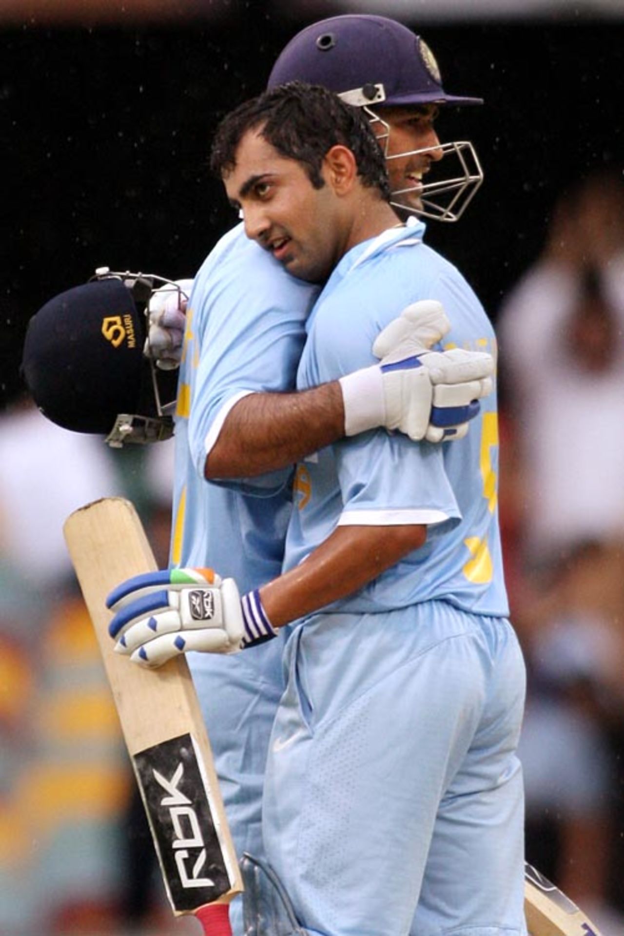 Gautam Gambhir is congratulated by Mahendra Singh Dhoni after he reached his hundred, India v Sri Lanka, CB Series, 2nd ODI, Brisbane, February 5, 2008