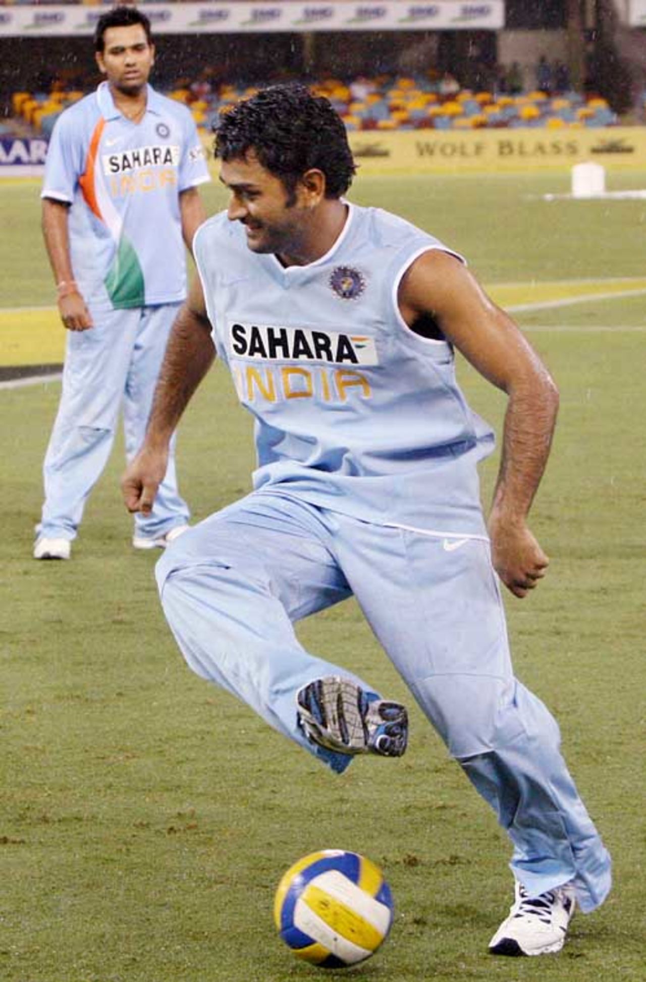 Mahendra Singh Dhoni plays football in the rain, India v Sri Lanka, CB Series, 2nd ODI, Brisbane, February 5, 2008