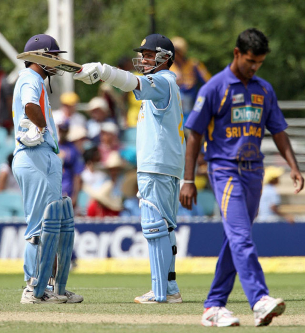 Rohit Sharma raises his bat after completing his half-century, India v Sri Lanka, CB Series, 5th ODI, Canberra, February 12, 2008 
