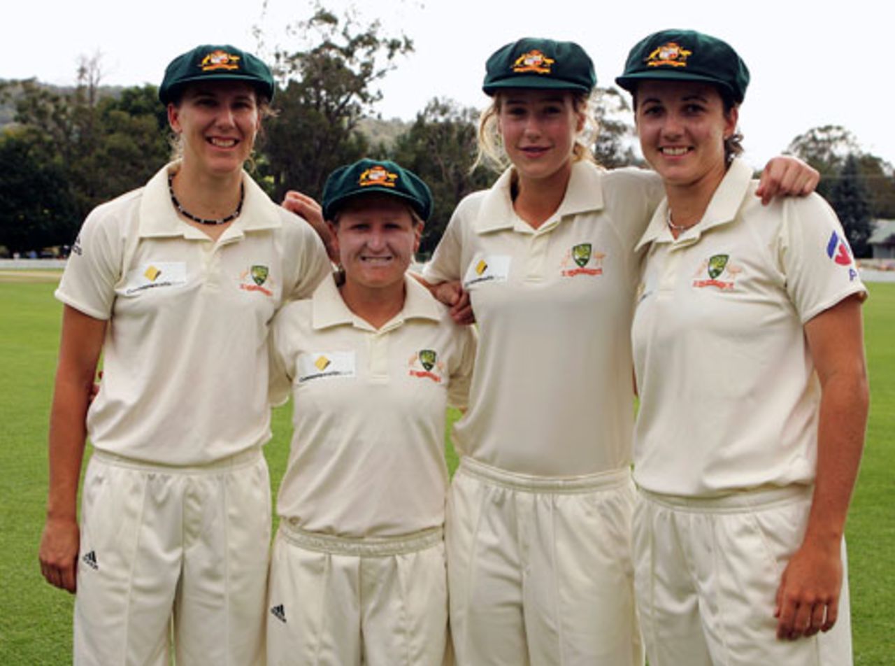 Emma Sampson, Leonie Coleman, Ellyse Perry and Kirsten Pike pose after receiving their caps , Australia v England, only Test, Bowral, February 15, 2008