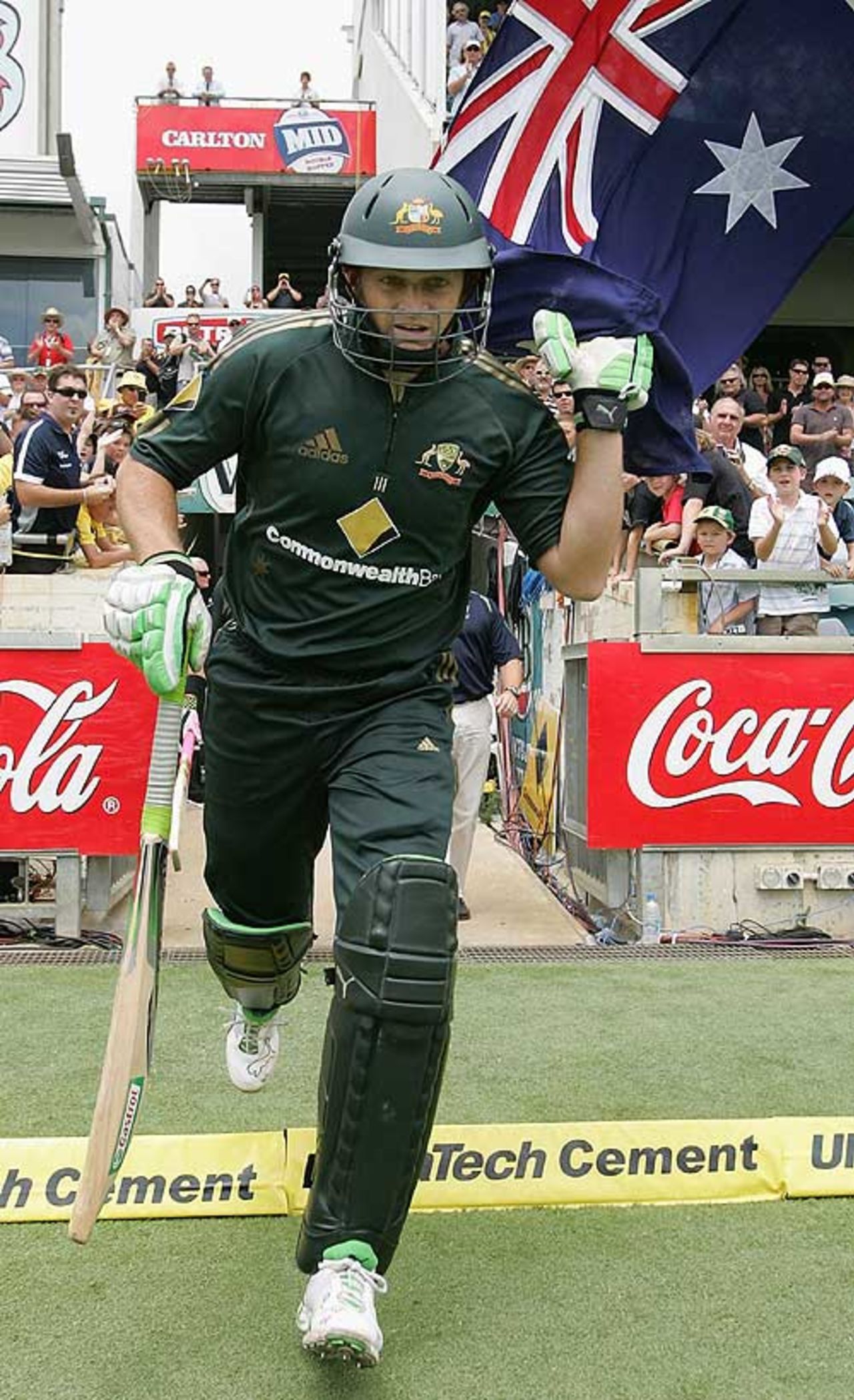 Adam Gilchrist touches the Australian flag as he walks out to bat, Australia v Sri Lanka, 6th Match, CB Series, Perth, February 15, 2008
