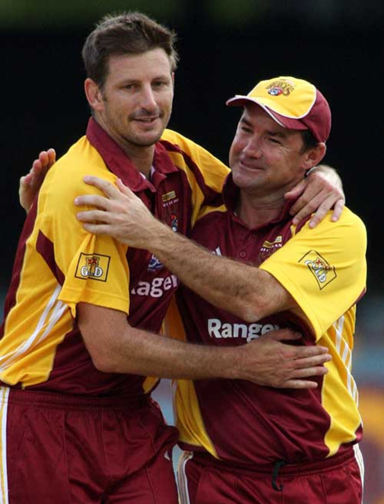 Jimmy Maher congratulates Michael Kasprowicz after his final delivery for Queensland, Queensland v Western Australia, FR Cup, Brisbane, February 16, 2008