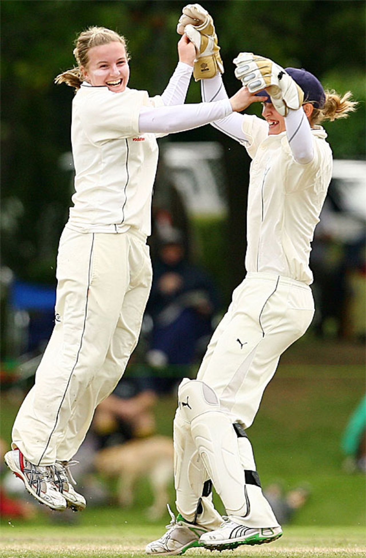 Holly Colvin and Sarah Taylor celebrate the breakthrough wicket of Shelley Nitschke, Australia v England, only Test, Bowral, 3rd day, February 17, 2008
