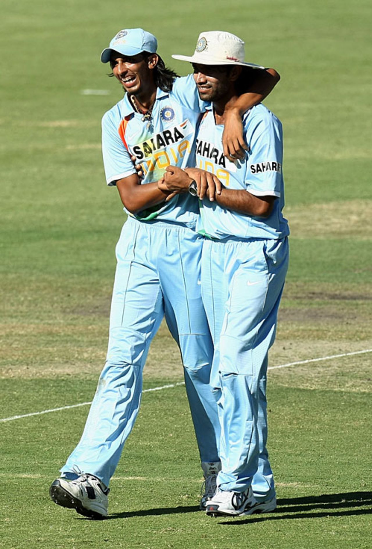 Ishant Sharma and Munaf Patel are all smiles after a good day on the field, Australia v India, 7th match, CB Series, Adelaide, February 17, 2008