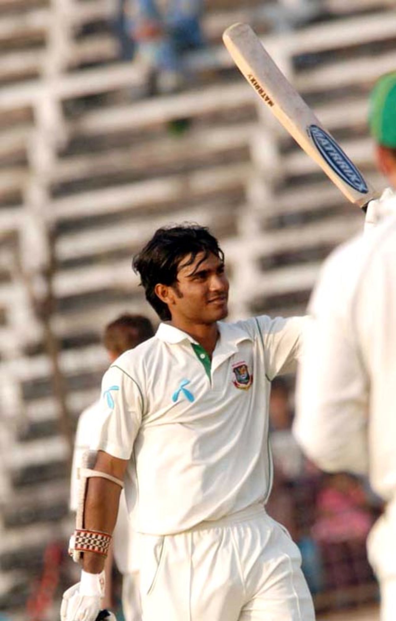 Junaid Siddique raises the bat after reaching his hundred, BCB XI v South Africans, 2nd day, Fatullah, February 18, 2008