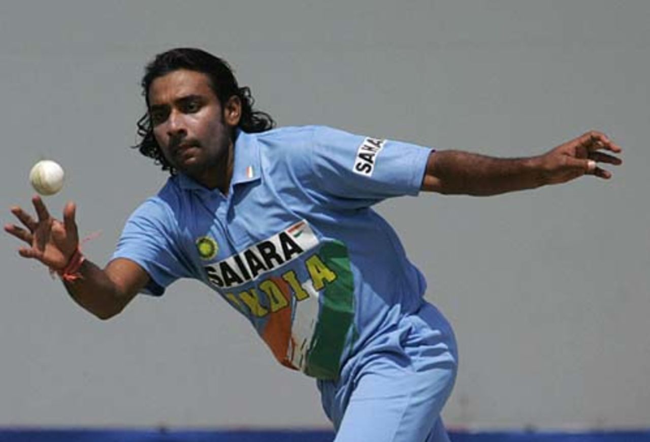 JP Yadav fields off his own bowling, India v New Zealand, Harare, September 2, 2005