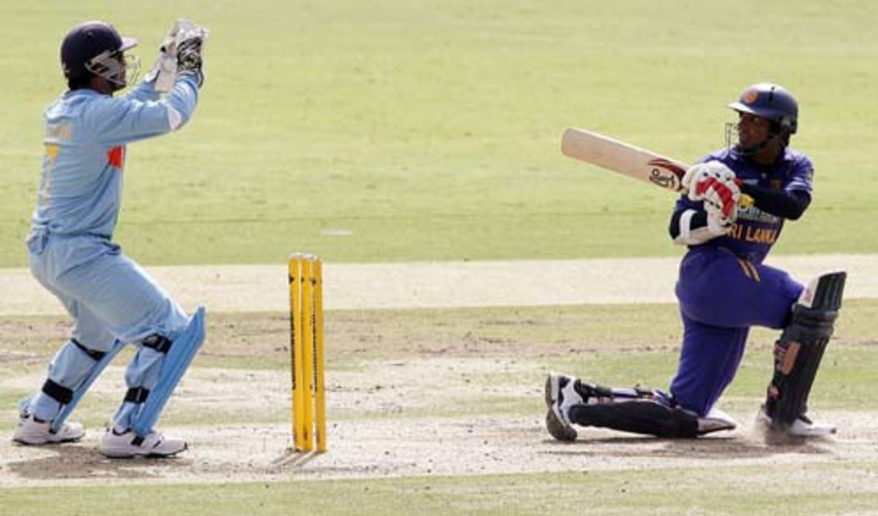 Kumar Sangakkara uses his wrists to good effect while playing a sweep shot, Sri Lanka v India, 8th match, CB Series, Adelaide, February 19, 2008 
