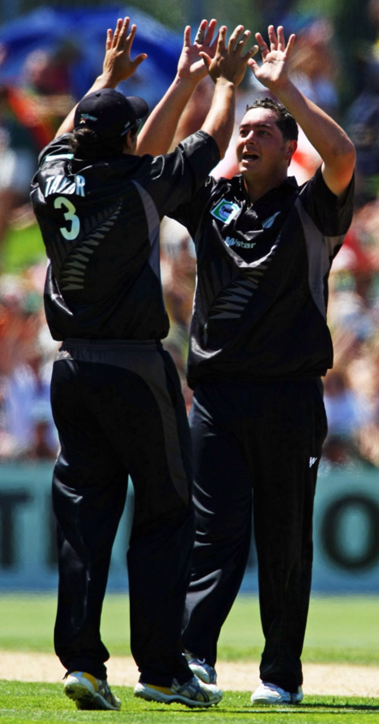 Jesse Ryder takes a high five after his second wicket in as many deliveries, New Zealand v England, 4th ODI, Napier, February 20, 2008