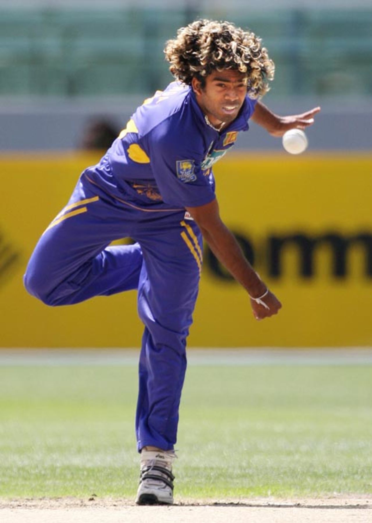 Lasith Malinga in his follow through, Australia v Sri Lanka, 9th  match, CB Series, Melbourne, February 22, 2008 
