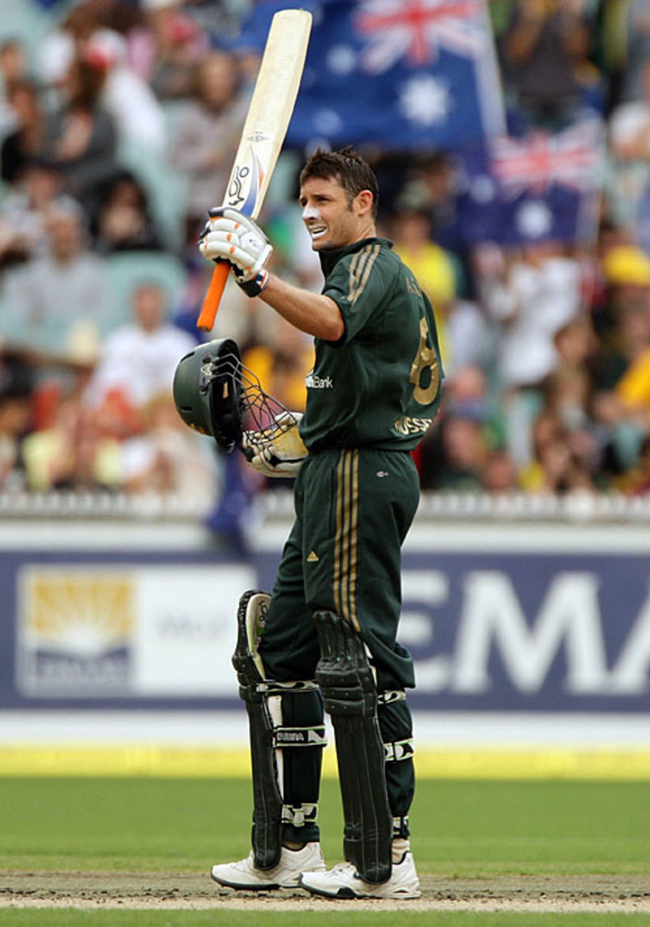 Michael Hussey raises his bat after getting to his fifty, Australia v Sri Lanka, 9th  match, CB Series, Melbourne, February 22, 2008 