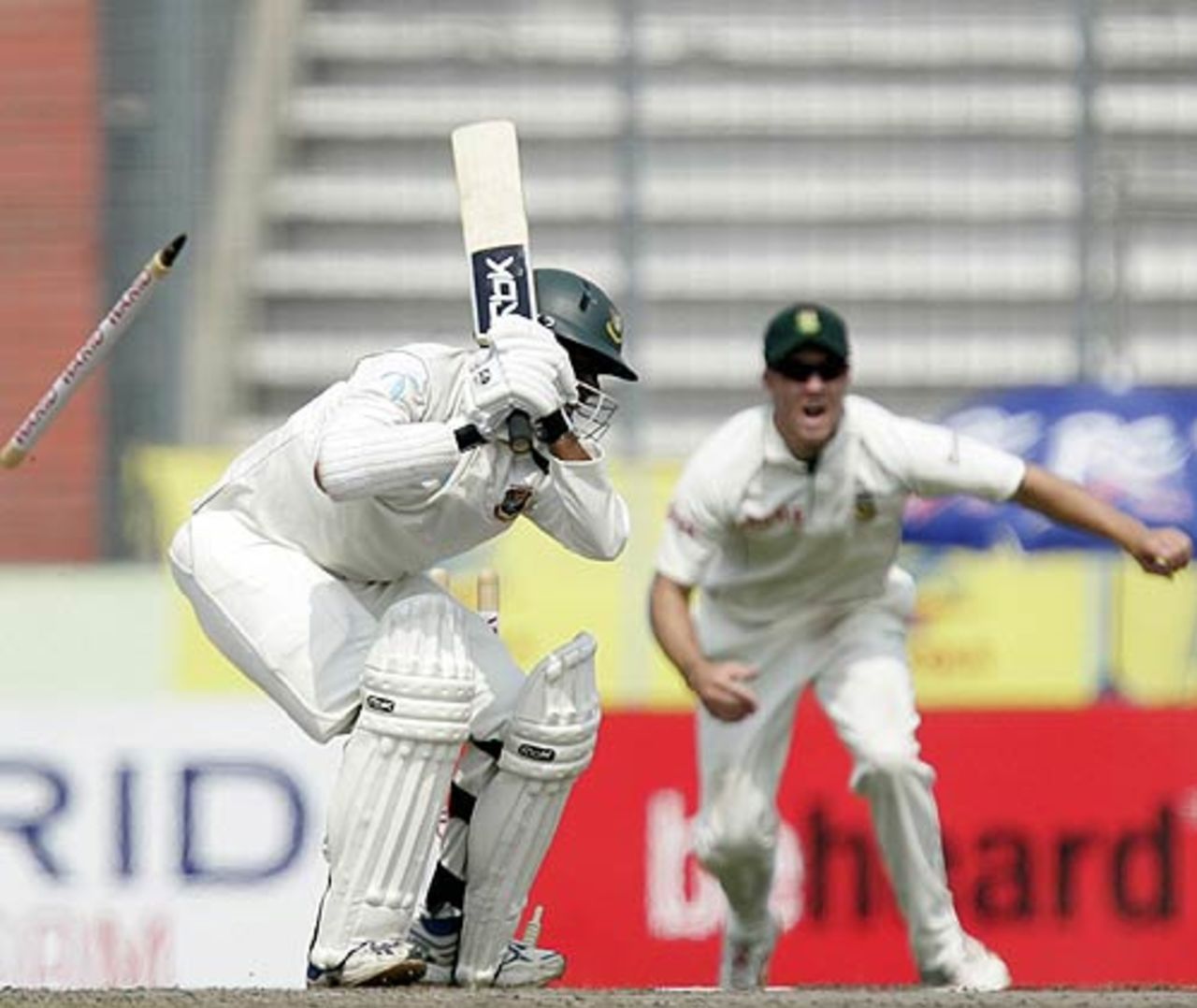 Mohammad Rafique's watches the off stump cartwheel, Bangladesh v South Africa, 1st Test, Mirpur, 3rd day, February 24, 2008 