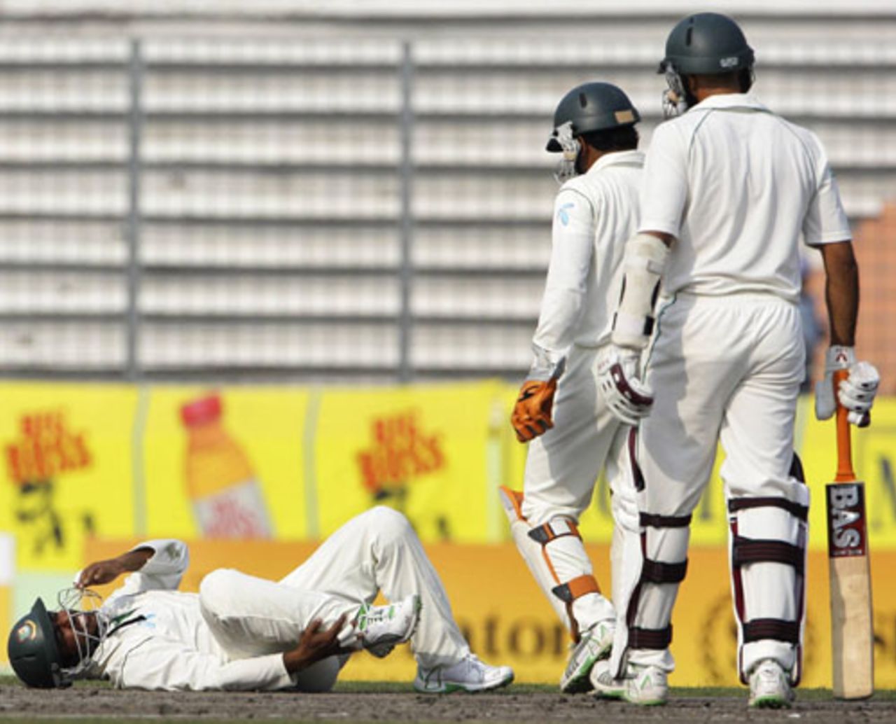 Aftab Ahmed reacts after being hit by a Hashim Amla shot, Bangladesh v South Africa, 1st Test, Mirpur, 3rd day, February 24, 2008 