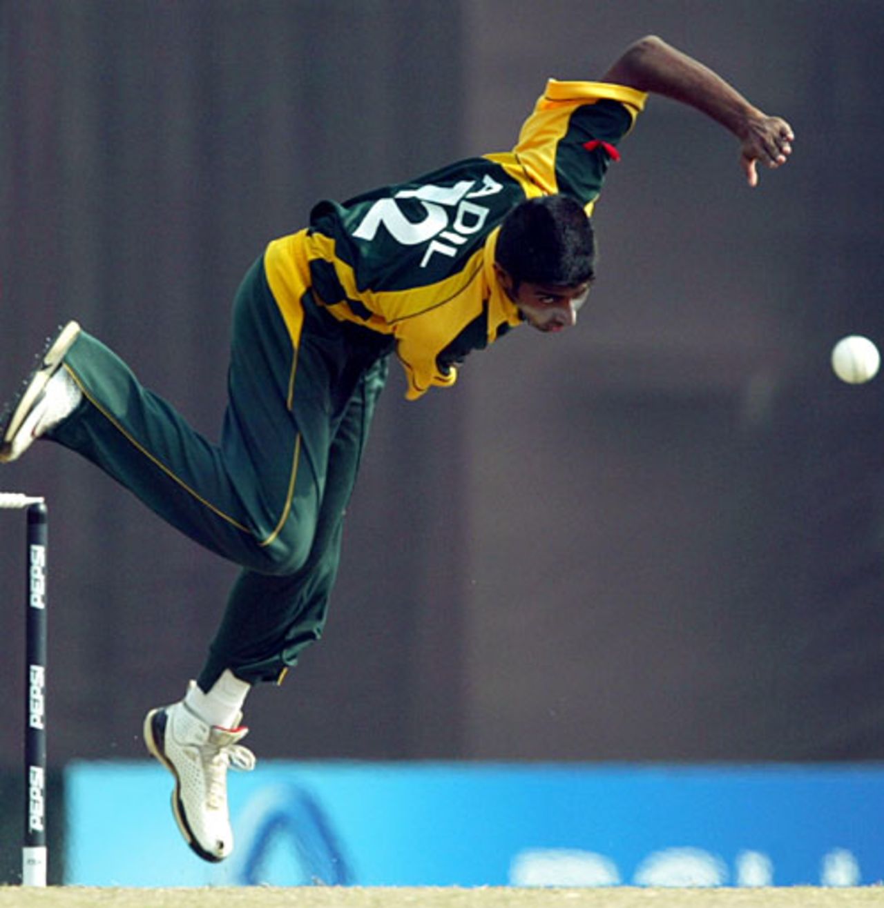 Adil Raza goes airborne in his follow through, Australia Under-19s v Pakistan U-19s, Under-19 World Cup quarter-finals, Kuala Lumpur, February 25, 2008