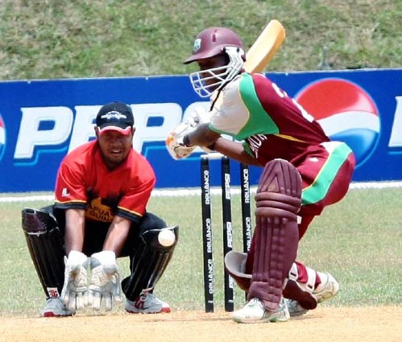 Horace Miller prepares to hammer the ball, Papua New Guinea U-19s v West Indies U-19s, Under-19 World Cup, Johor, February 27, 2008