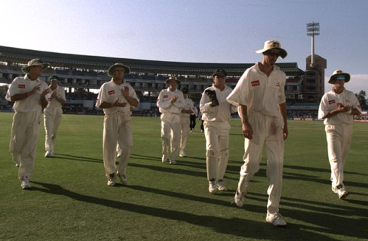 Jason Gillespie leads his team-mates off the field after bagging his first five-for, South Africa v Australia, 2nd Test, Port Elizabeth, March 14-18, 1997