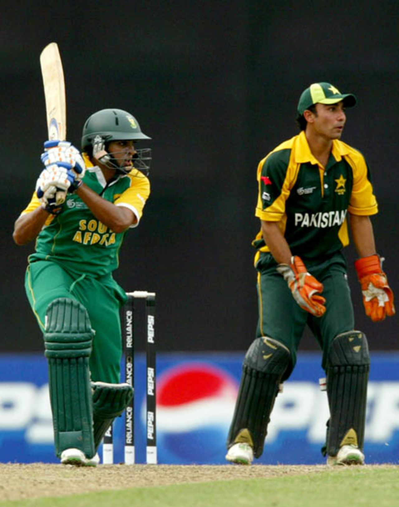 Jonathan Vandiar guides one through the off side as Ali Asad looks on, Pakistan v South Africa, 2nd semi-final, Under-19 World Cup, Kuala Lumpur, February 29, 2008 