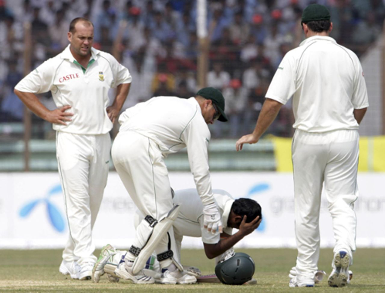 Aftab Ahmed in pain after being struck by a bouncer from Jacques Kallis, 	Bangladesh v South Africa, 2nd Test, Chittagong, 3rd day, March 2, 2008 


