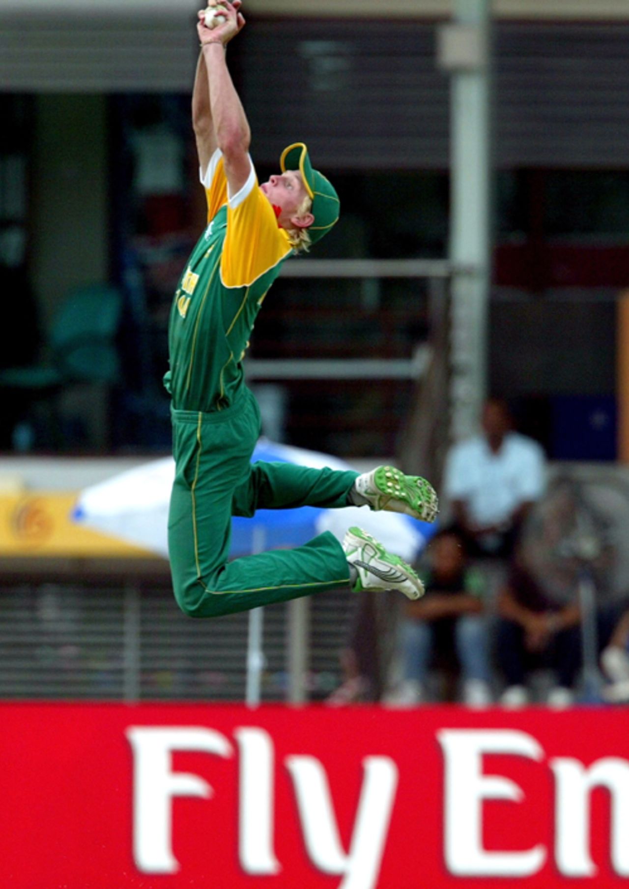 Sybrand Engelbrecht takes flight to hold on to a sensational catch , India v South Africa, Under-19 World Cup final, Kuala Lumpur, March 2, 2008 
