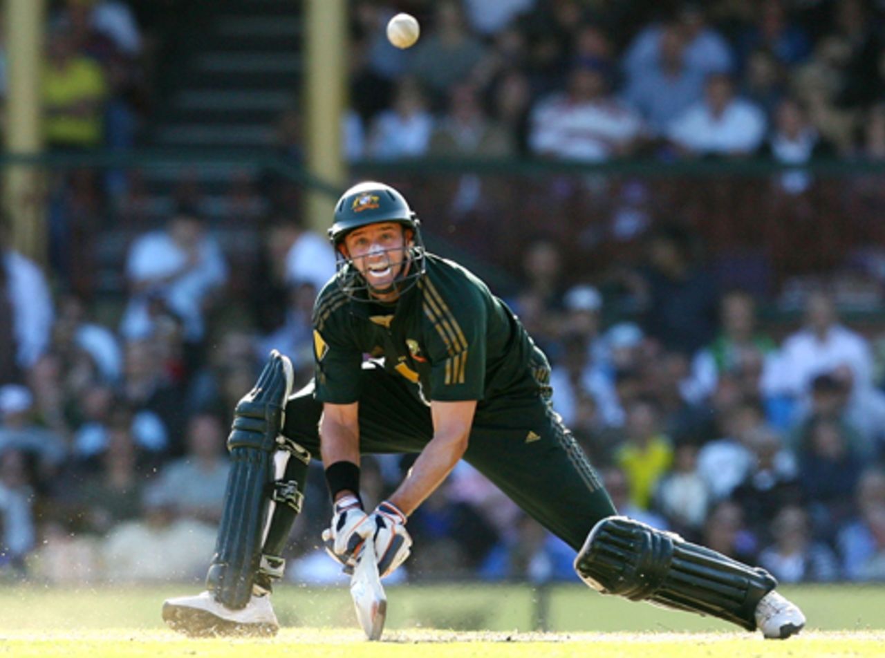 Michael Husseys plays a reverse sweep,  Australia v India, CB Series, 1st final, Melbourne, March 2, 2008 

