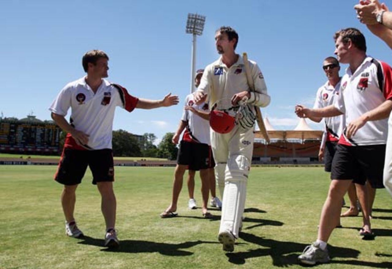 Jason Gillespie is congratulated by his team-mates after making 51 in his final Pura Cup innings, South Australia v Queensland, Pura Cup, Adelaide, March 3, 2008