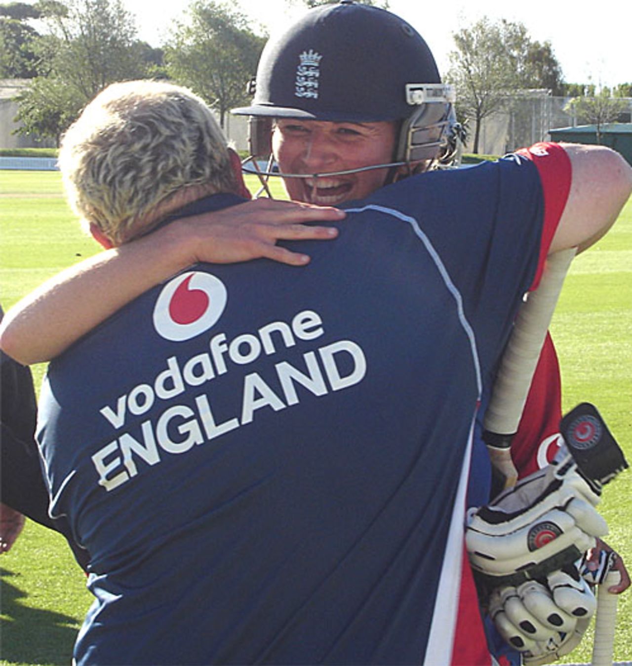 Charlotte Edwards is congratulated by coach Mark Lane after leading England to a 3-1 series win, New Zealand v England, 5th women's ODI, Lincoln, March 3, 2008