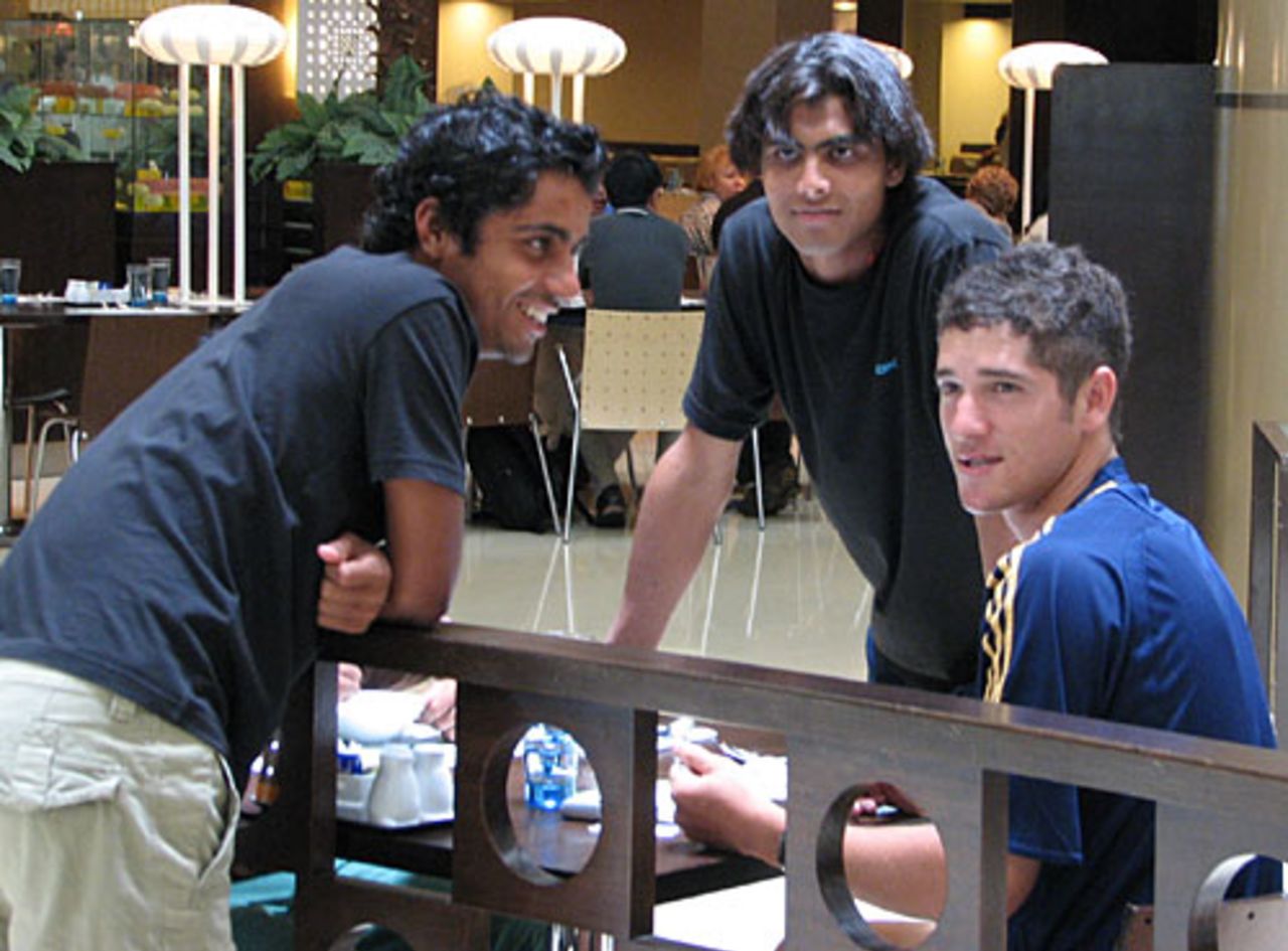 Wayne Parnell, Iqbal Abdulla and Ravindra Jadeja chat during breakfast, Kuala Lumpur, March 3, 2008
