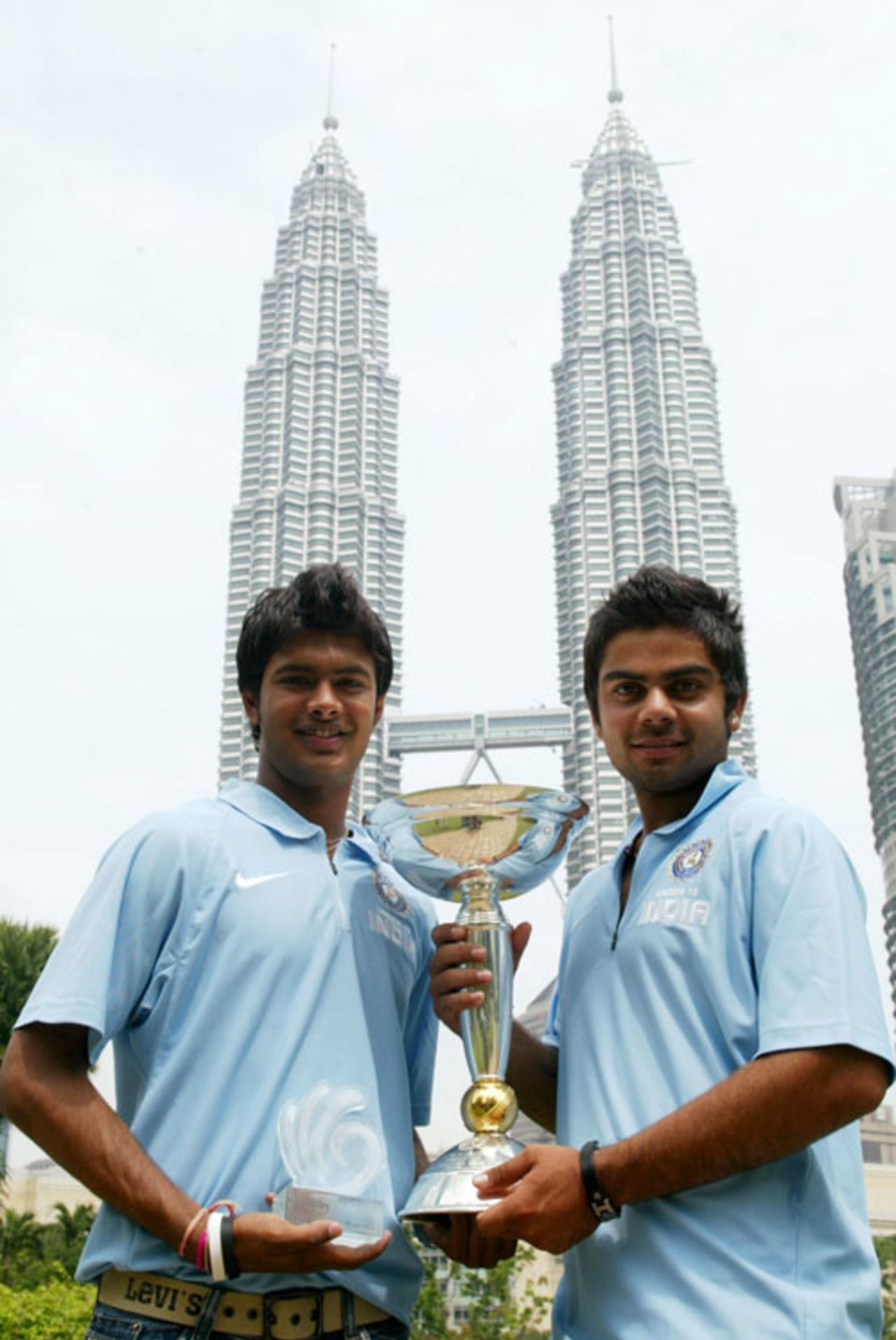 Ajitesh Argal and Virat Kohli of India pose with the Under-19 World Cup, Kuala Lumpur, March 3, 2008