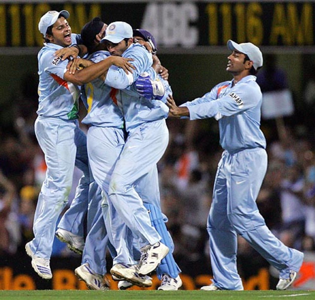 Harbhajan Singh is mobbed by his team-mates after the Hayden run-out, Australia v India, CB Series, 2nd final, Brisbane, March 4, 2008 