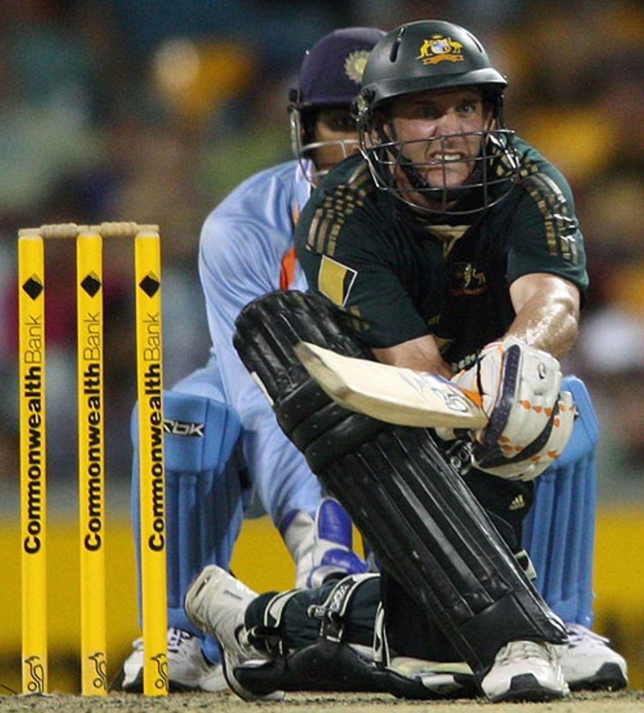 Michael Hussey reverse-paddles on his way to a vital 44, Australia v India, CB Series, 2nd final, Brisbane, March 4, 2008 